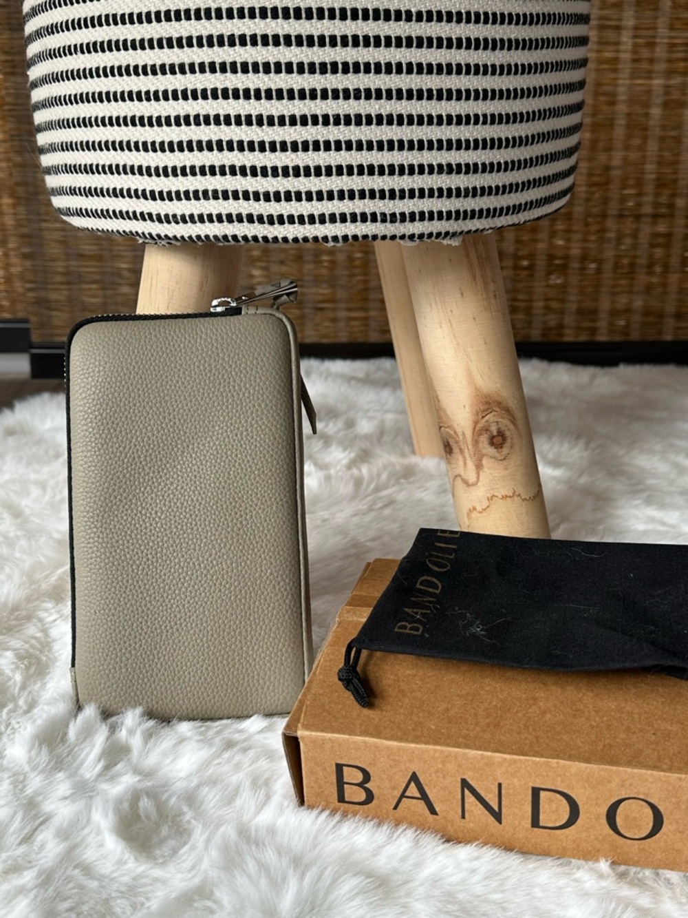 Bandolier Pebbled Leather Zip Pouch Greige attaches to phone case